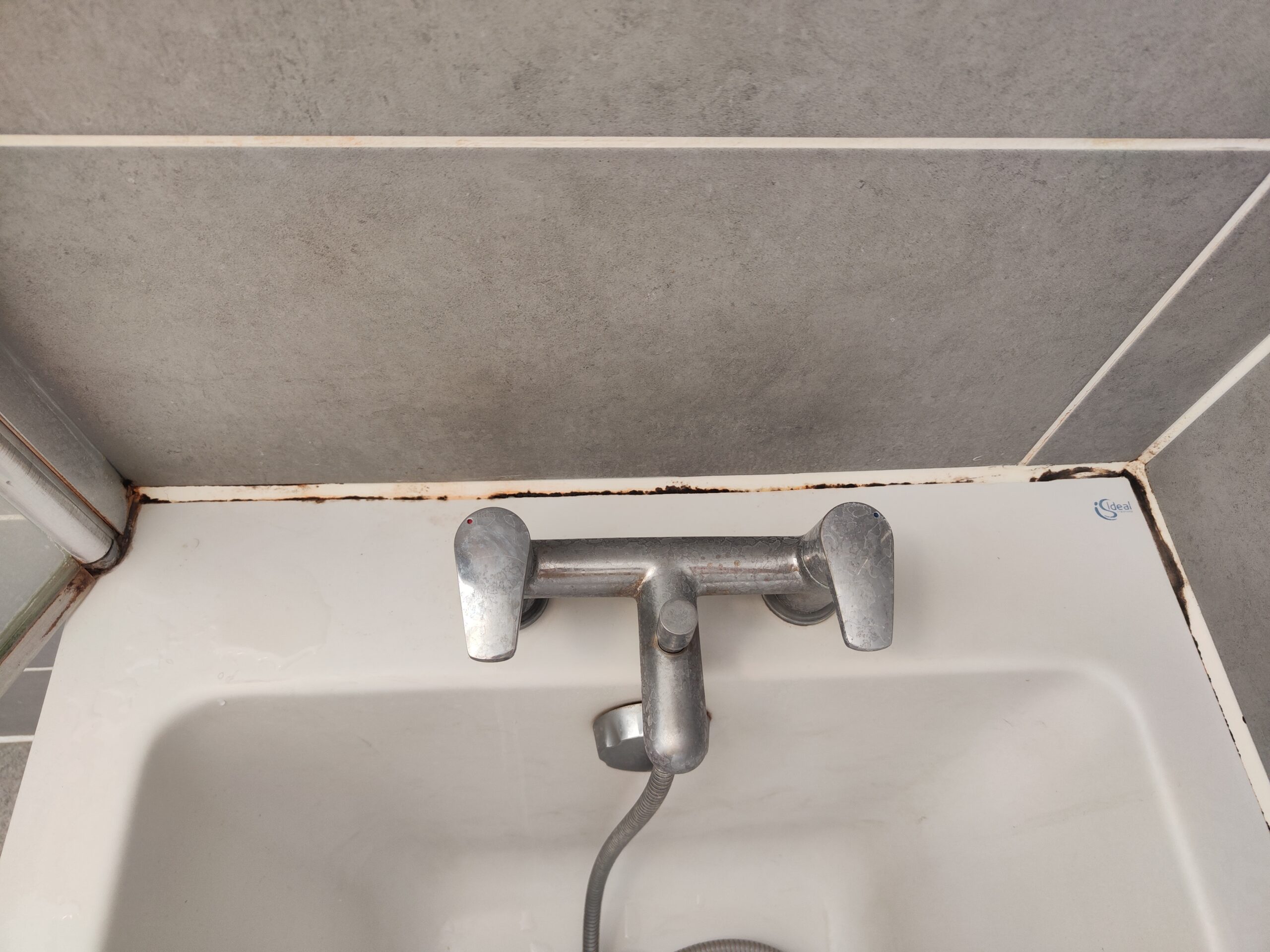 before replacement of silicone bathtub